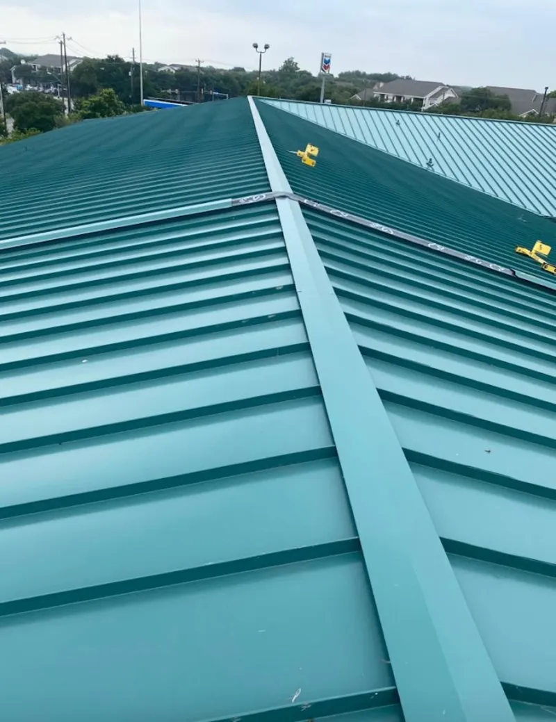 Green commercial metal roof ridge and valley for Metal Roof Repair in Eureka